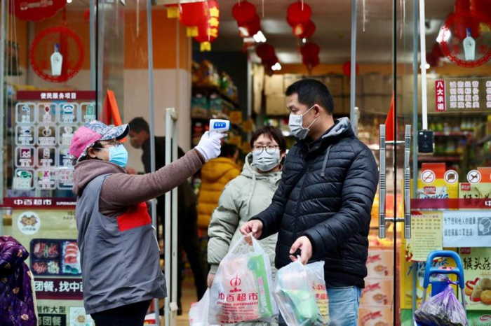 Contrôle frontal de température à Wuhan, province d'Hubei, Chine 7 Février 2020