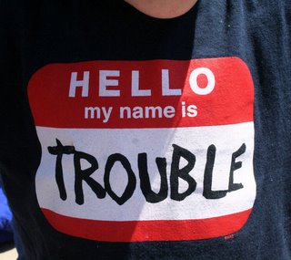 - "T-shirt" "Hello my name is TROUBLE" "Hello mon nom est trouble" -