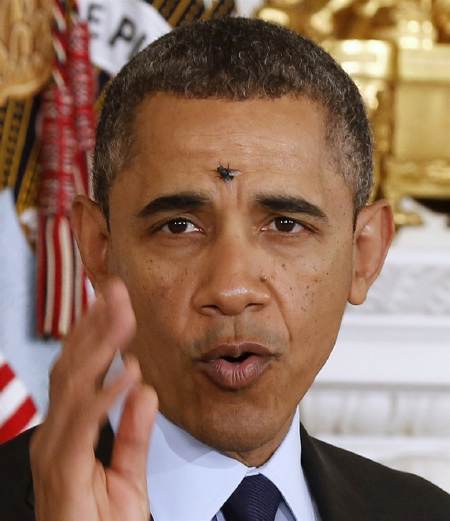 B.Obama avec une mouche sur le visage